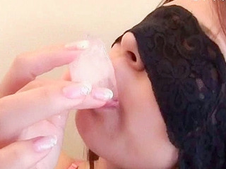 Asian babe sucking a lollipop gets soaking wet for some sweet XXX action!