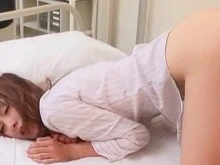 Fucking a Japanese chick's xxx nipple-pinched pussy in a Tokyo hospital room.